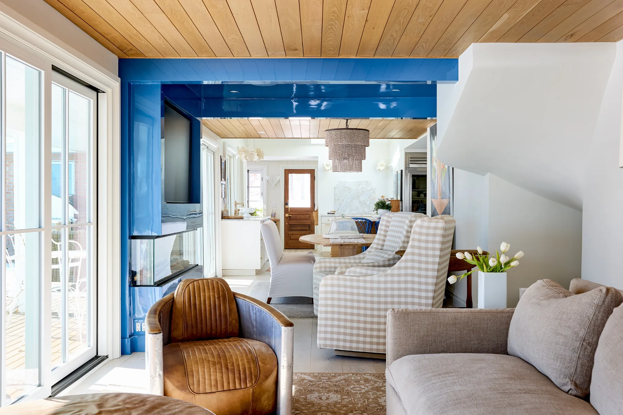 Ogunquit renovation and addition with custom blue structural opening